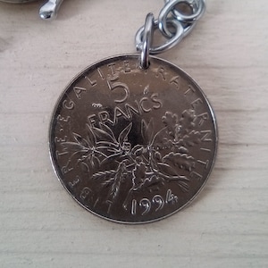 5 franc coin key ring French Semeuse from 1994.
