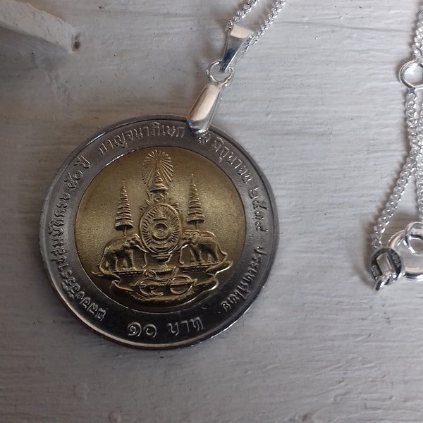 Necklace with Thai 10 baht coin pendant and 925 sterling silver.