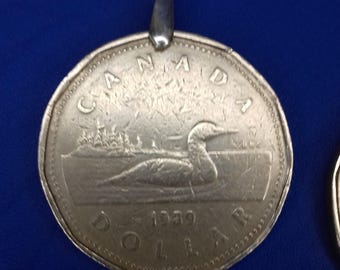 Canadian Elizabeth II 1 dollar coin medallion.