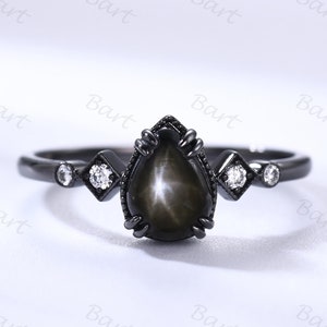 Bague poire, saphir étoilé noir, or noir, 5 pierres, bague de fiançailles moissanite, saphir étoilé Lindy, pierre de naissance gothique, bague de promesse étoile noire
