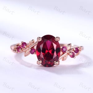 Ruby Engagement Ring: 1.5 Carat Oval, Rose Gold Leaf Branch Ring Set