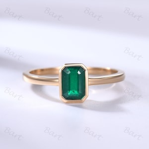 Emerald Cut Emerald Solitaire Ring: 14k Yellow Gold Bezel Setting