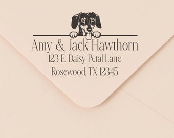 May include: A cream-colored envelope with a black dachshund dog illustration above the text "Amy & Jack Hawthorn" and address details: 123 E. Daisy Petal Lane, Rosewood, TX 12345.