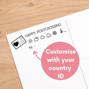 Könnte beinhalten: Eine weiße Postkarte mit schwarzen Stempelaufdrucken, darunter der Text HAPPY POSTCROSSING, ein Postkarten-Symbol mit Herz, Wettersymbole für Sonne, Wolken, Regen und Schnee, ein Thermometer-Symbol sowie der Text NL mit einer Lücke.