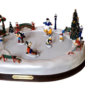 Mr Christmas Holiday Skaters - Etsy