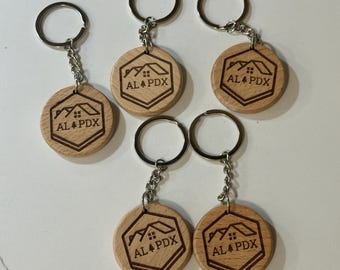 Round Light Wood keychain laser engraved with your choice of image!