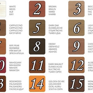 May include: A chart with 15 wood stain colors, numbered 1 through 15. Each color has a name in English and a corresponding name in another language. The colors range from white to dark brown.