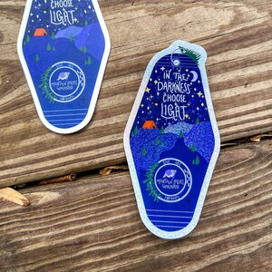 Motel Key Tag Sticker | Outdoorsy Camping Sticker | In the Darkness Choose Light