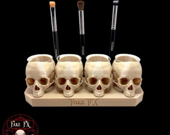 Portavasos con forma de calavera