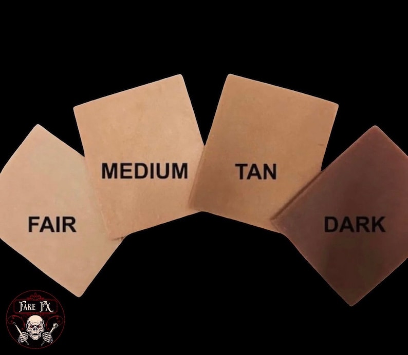 May include: Four square swatches labelled "FAIR", "MEDIUM", "TAN", and "DARK" in varying shades of beige and brown. The swatches are arranged diagonally against a black background. The logo "Fake FX" is in the lower left corner.