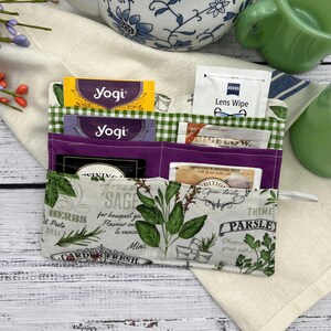 this tea wallet is also good for sweeteners, lens, cleaners, loyalty, card holder, credit card holder a little bit of cash and keeping your purse bag or carry-on organized