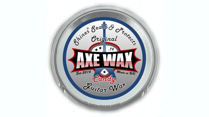 May include: A silver tin with a blue and red label that reads "Shines Seals & Protects Original .76 AXE WAX Est. 2016 * Made in UK Candy Guitar Wax".