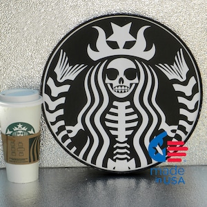 Starbucks skeleton siren logo, as a framed round poster