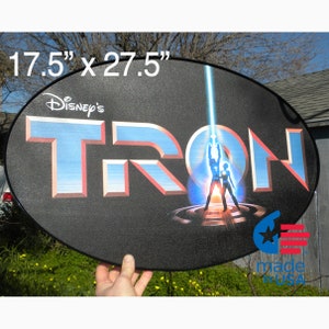 TRON movie logo, as an oval framed sign