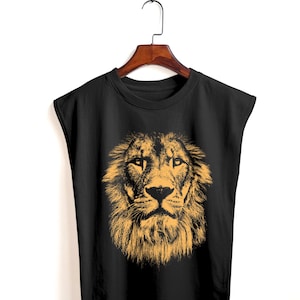 May include: Black sleeveless t-shirt with a graphic print of a lion's face in a yellow-orange color.