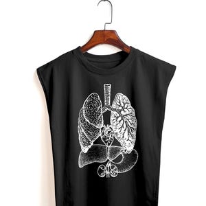 May include: Black sleeveless t-shirt featuring a detailed white anatomical illustration of the lungs, heart, and other internal organs. The design is centered on the shirt, creating a striking contrast.