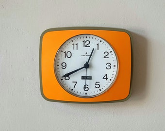 Junghans ato-mat mid century modern wall clock yellow and green olive plastic