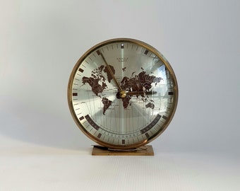 Vintage world clock by Kienzle Heinrich muller design from 70's made of brass