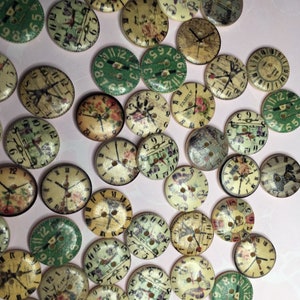 May include: A collection of round wooden buttons with clock faces. The buttons feature various designs, including floral patterns and clock hands. The color palette includes cream, green, and brown tones, with a vintage aesthetic. Each button has two holes for sewing.