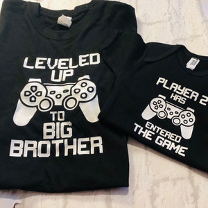 Matching brother gamer clothing, T-shirt and vest, levelled up to big brother, player 2 has entered the game