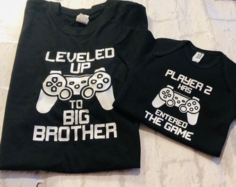 Matching brother gamer clothing, T-shirt and vest, levelled up to big brother, player 2 has entered the game