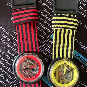 2 vintage defective Pop Swatch watches from 1988