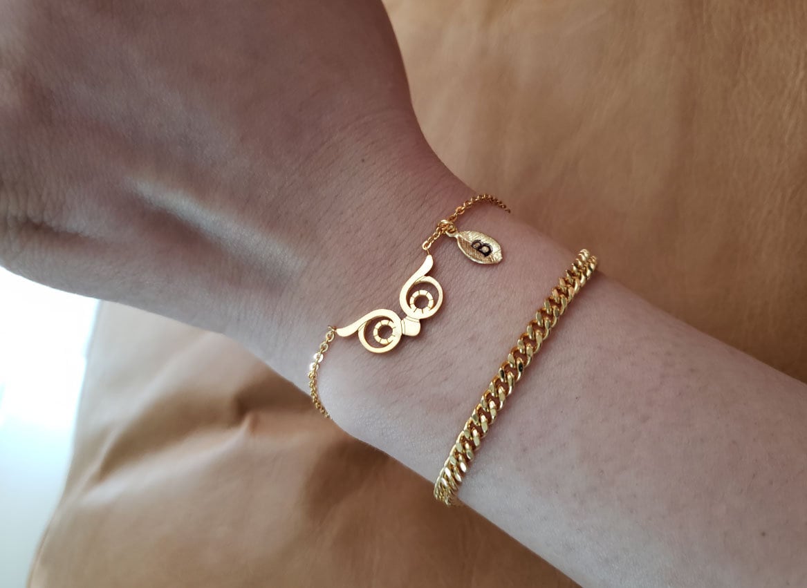 Gold owl best sale bracelet