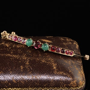 Antique Victorian 15K Yellow Gold Garnet and Emerald Bangle Bracelet