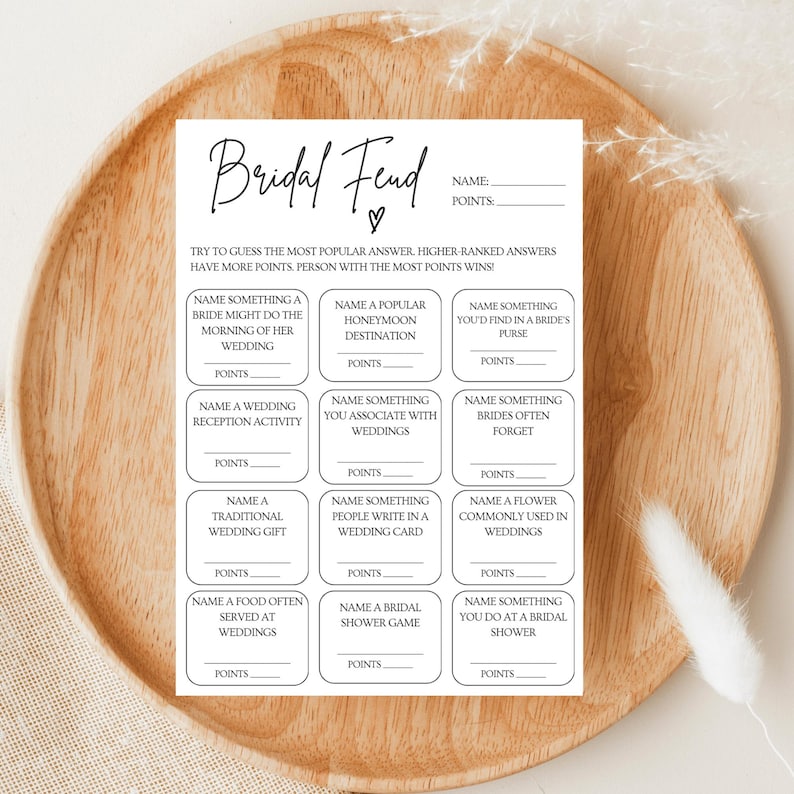 May include: A printable bridal shower game called "Bridal Fend" with 12 questions to test guests' knowledge of wedding traditions. The game instructs players to guess the most popular answer to each question and award points accordingly.