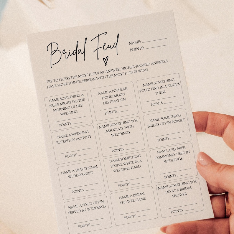 May include: A printable bridal shower game with a beige background and black text. The game is called "Bridal Feud" and asks players to guess the most popular answers to wedding-related questions.  The player with the most points wins.