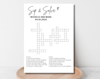 May include: A white card with a crossword puzzle titled "Sip & Solve" for Michelle and Mark, dated 09.01.2025. The puzzle includes clues like "Her favorite flower" and "Their wedding hashtag."