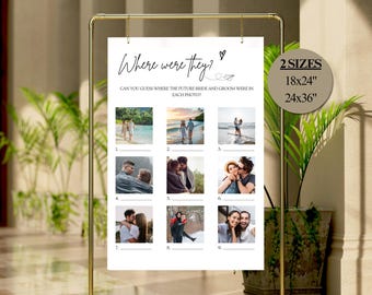 May include: A gold metal stand holding a white sign with the text "Where were they?" and a heart symbol. The sign features nine photos and the text "CAN YOU GUESS WHERE THE FUTURE BRIDE AND GROOM WERE IN EACH PHOTO?" with two size options: 18x24" and 24x36".