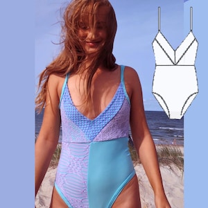 May include: A one-piece swimsuit featuring a deep V-neckline with light blue textured fabric on the bodice and a solid light blue panel on the right side. The left side displays a patterned lace overlay, complemented by a technical line drawing.
