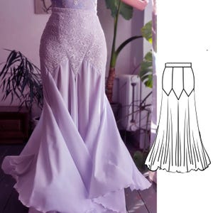 Puede incluir: Un vestido formal de color lila con un corpiño de encaje y una falda fluida. La falda se ensancha desde las caderas, creando una silueta dramática. El vestido está hecho de una tela suave y sedosa.