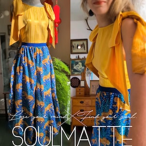 May include: A bright yellow sleeveless top with wide shoulder ties and a blue skirt featuring a repeating pattern of yellow leopards. The text "Lose your mind, find your soul. SOULMATTE" is overlaid on the image in white script and block lettering.