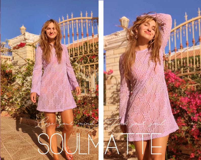 May include: A woman wearing a light purple, lacy, long-sleeved dress with a geometric pattern. The dress has a loose fit and falls to just above the knees. The woman is standing in front of a white gate with a pink flower bush behind her. The text "Lose your mind, find your soul" is written on the image.