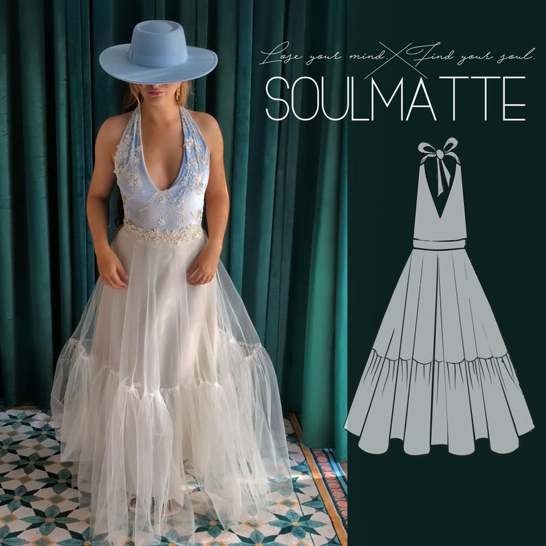 May include: A light blue wide-brimmed hat and a floor-length dress with a light blue halter bodice featuring white floral embroidery and a sheer white tulle skirt. The text reads: Lose your mind. Find your soul. SOULMATTE.