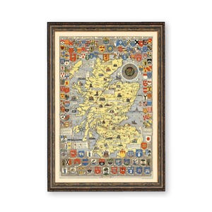 May include: A vintage map of Scotland with a yellow background and a detailed outline of the country. The map is surrounded by a border of coats of arms in various colors, including red, blue, green, and gold. The map is framed in a brown wooden frame.