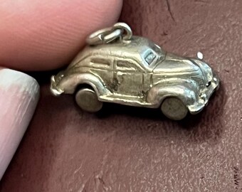 Vintage sterling mechanical classic car charm pendant with moving wheels