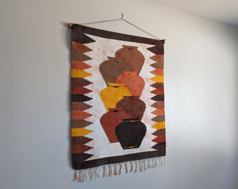 Vintage Mexico weaving wall hanging featuring large ceramic pots, orange brown rustic home decor, autumn coloured tapestry