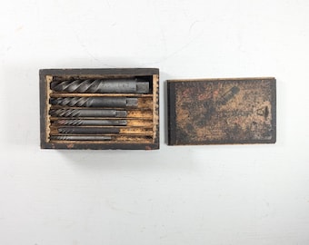 Antique wooden box with Screw extractor bit set