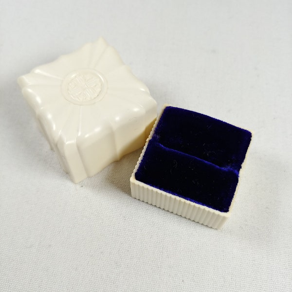 Vintage cream white ring box stylized lotus top, lift top plastic jewelry storage box with royal purple ring cushion