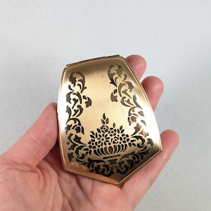 Vintage Elgin American Beauty goudkleurig bloemenpoeder compact in goede staat, gemaakt in de VS