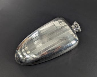 Art Deco "The Sportsman" 16 ozs Plated Engine turned hip flask, empty cartouche