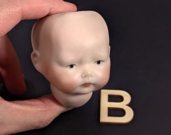 Vintage Creepy Baby porcelain Doll head, old doll parts