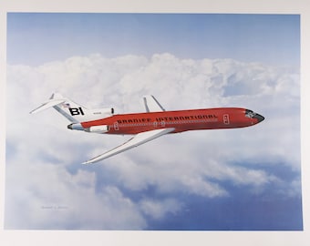 May include: A red and white Braniff International Boeing 727-100 airplane flies through a cloudy sky. The plane has the text "Braniff International" on the side and "BI" on the tail.