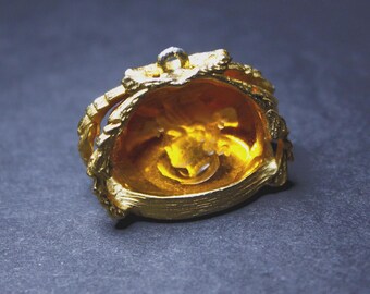 Vintage yellow glass Medusa intaglio fob, gentlemans watch fob