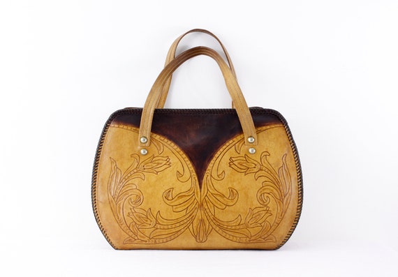 Art nouveau style tooled leather handbag, 1960s to