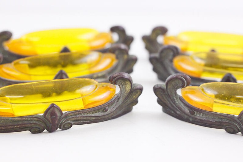 Orange bakelite Art Deco drawer pull sunburst bakelite on brassed copper drawer handles
