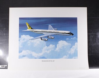 May include: A vintage print of a Douglas DC-8F Fan-Jet airplane in flight against a blue sky with fluffy white clouds. The aircraft is white with black and yellow accents, and the text "Seaboard World Airlines" is visible.